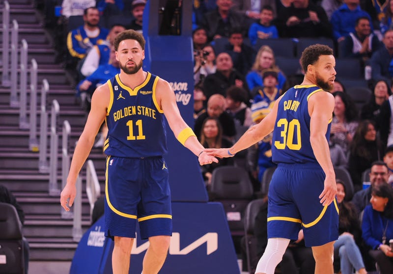 Dec 2, 2022; San Francisco, California, USA; Golden State Warriors shooting guard Klay Thompson (11) and point guard Stephen Curry (30) high five after Thompson scored with an assist from Curry during the first quarter against the Chicago Bulls at Chase Center