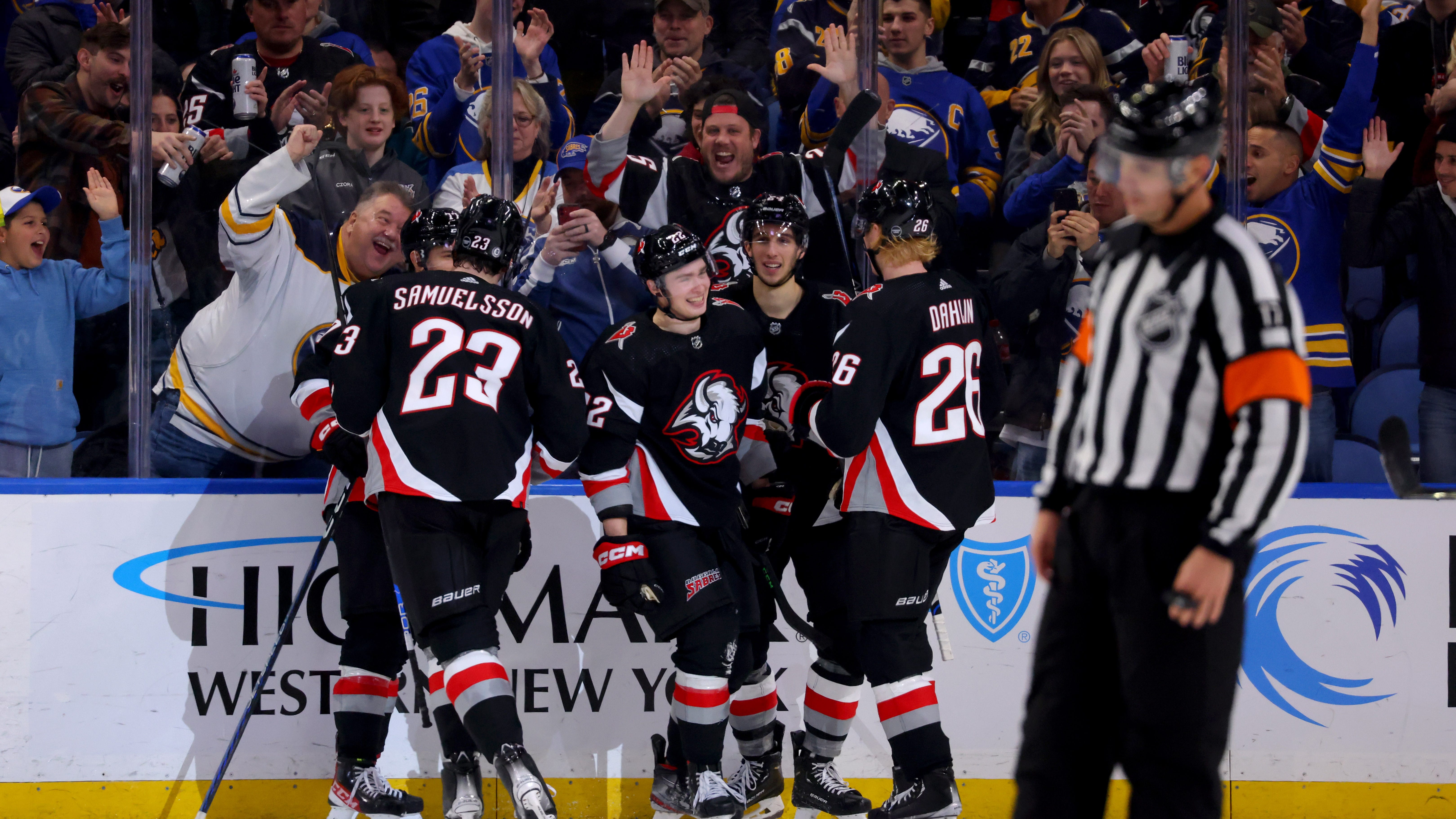 Sabres use big second period to double up Sharks