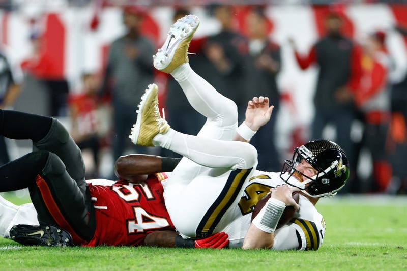 Saints quarterback Andy Dalton on the ground
