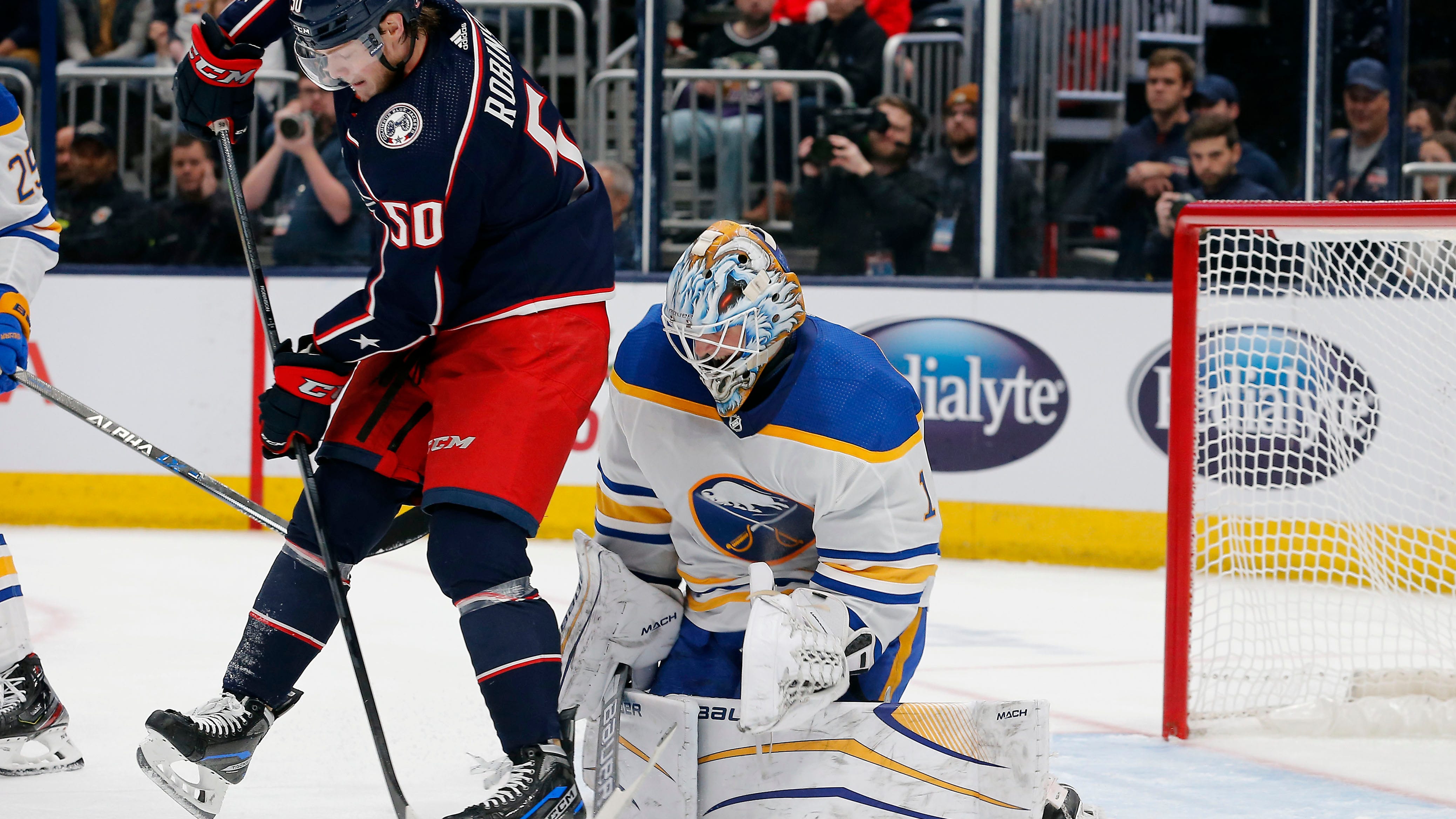 Slumping Sabres tweak lineup by acquiring Eric Robinson in trade with Blue Jackets
