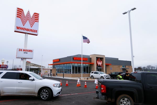Cars wait in the drive-thru for Whataburger in Republic during its grand opening on Monday, Dec. 12, 2022. Four more Whataburgers are planned to open in the Springfield area in 2023