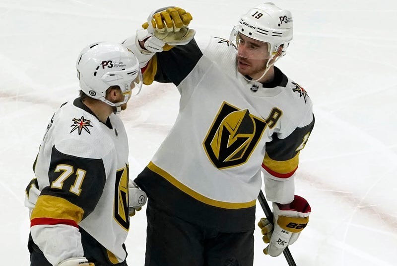 Vegas Golden Knights right wing Reilly Smith (19) celebrates his goal with center William Karlsson (71) during the second period at United Center.