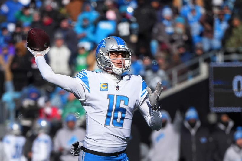 Dec 24, 2022; Charlotte, North Carolina, USA; Detroit Lions quarterback Jared Goff (16) throws a touchdown pass in the first quarter at Bank of America Stadium