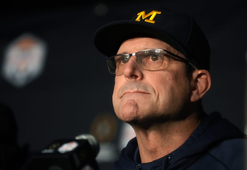 Jim Harbaugh said Thursday afternoon he intends to remain with the Wolverines through the 2023 season, but if he does, he and the program will reportedly face an NCAA investigation for "alleged violations during the COVID-19 recruiting dead period," ESPN reported.