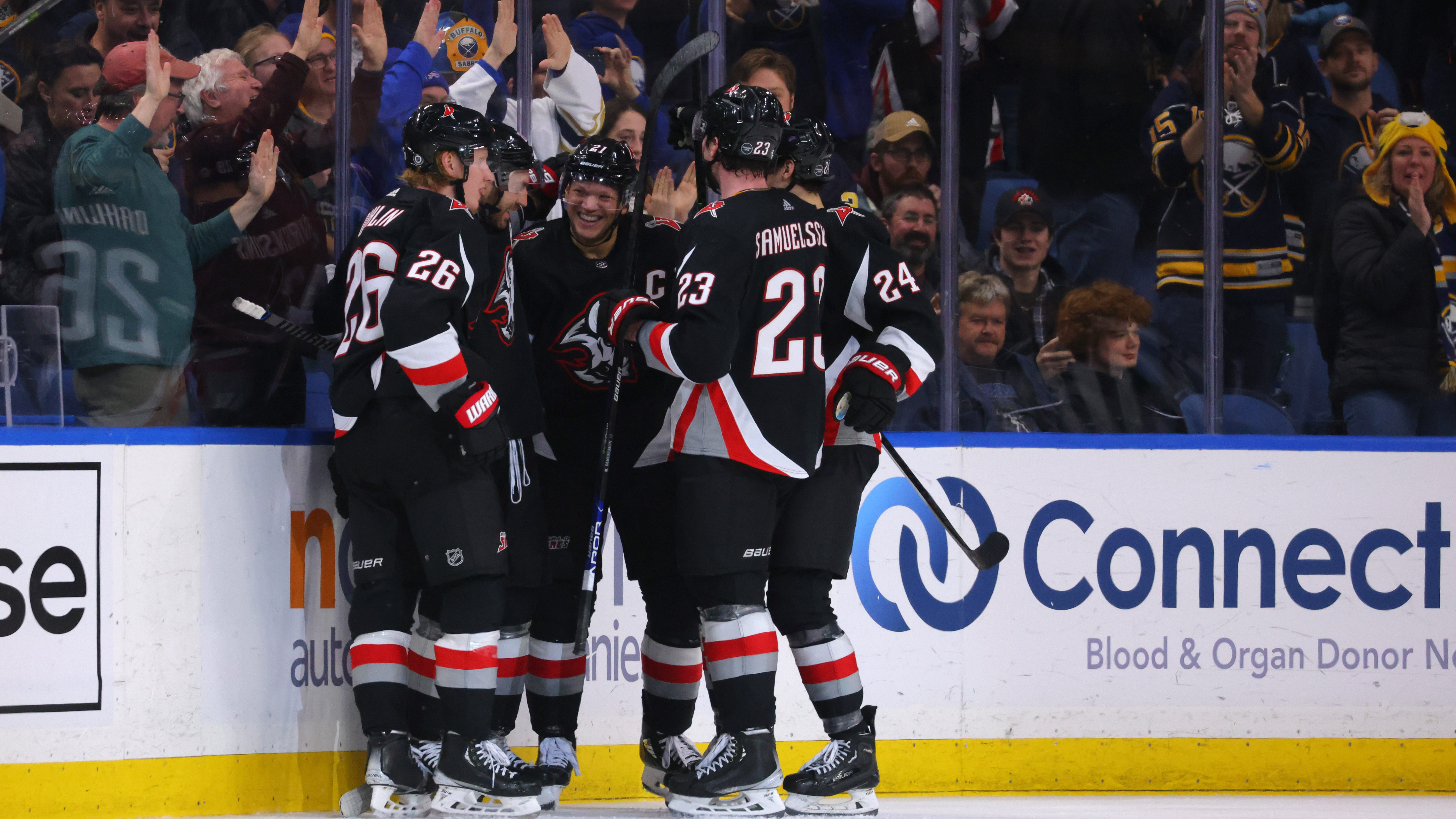 Sabres double up Detroit after long layoff