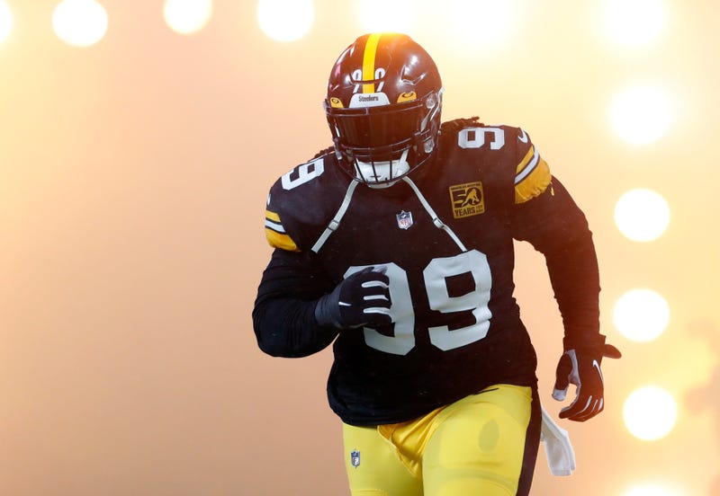 Larry Ogunjobi running out on the field