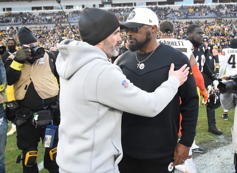 Jan 8, 2023; Pittsburgh, Pennsylvania, USA; Cleveland Browns head coach Kevin Stefanski (left) meets with Pittsburgh Steelers head coach Mike Tomlin after a Steelers 28-14 win at Acrisure Stadium.