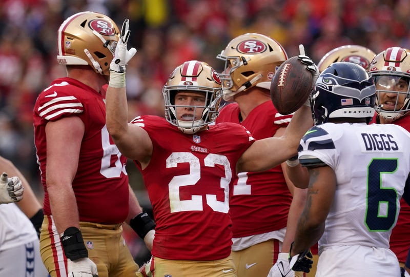 Christian McCaffrey signals touchdown