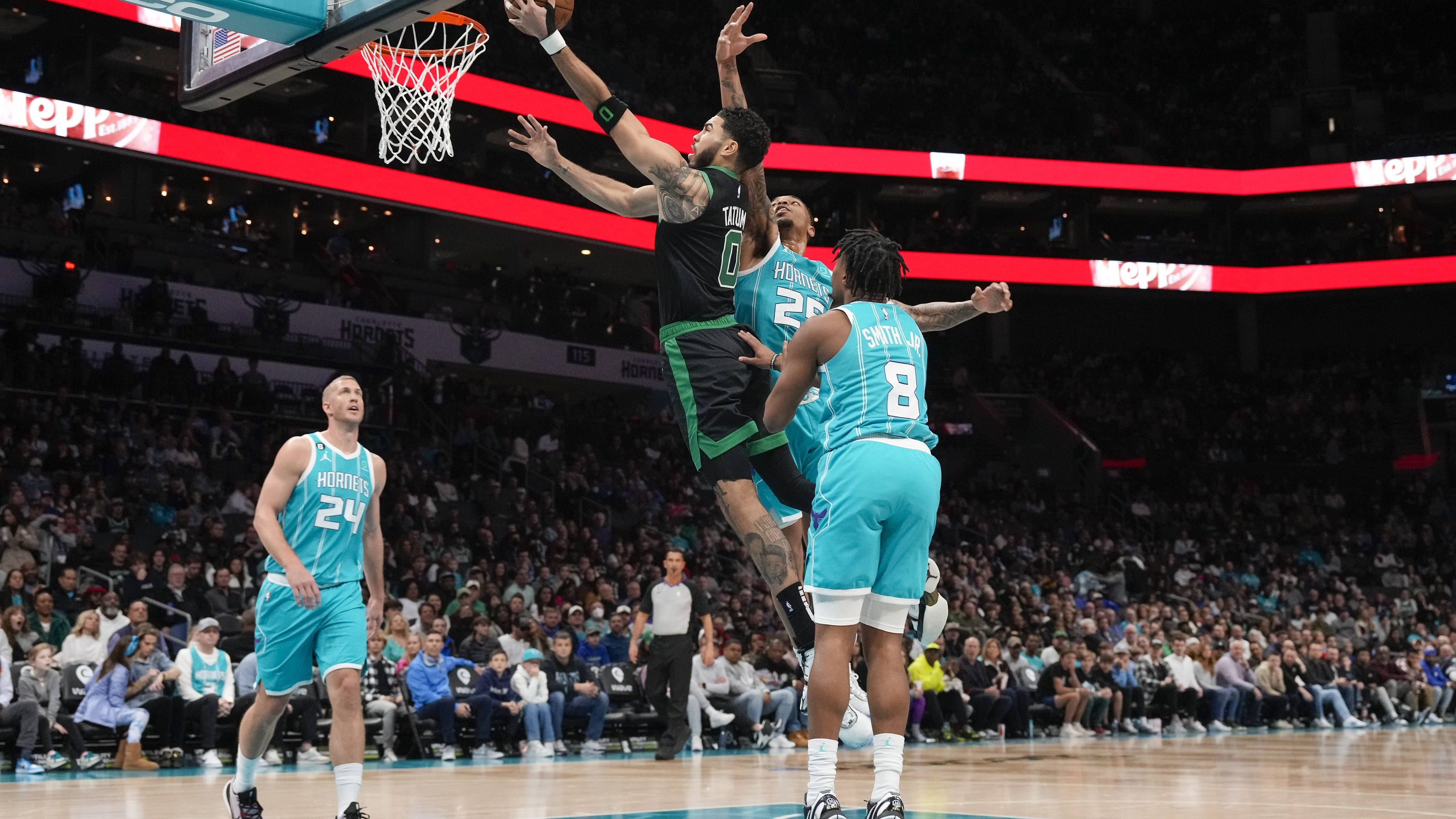 Jayson Tatum makes history as Celtics hold off Hornets