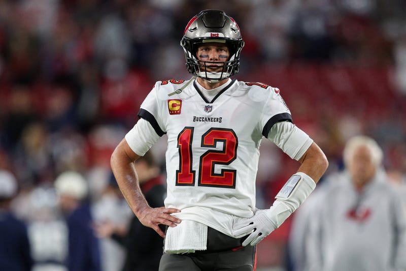 Tampa Bay Buccaneers quarterback Tom Brady (12) looks on before a wild card game against the Dallas Cowboys at Raymond James Stadium.