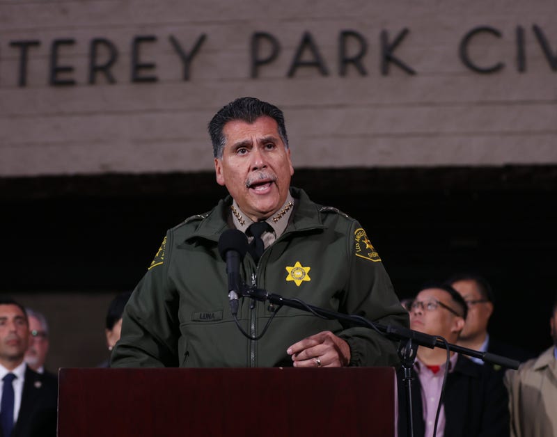 robert luna speaks at podium