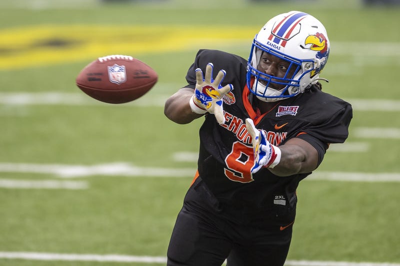 National defensive lineman Lonnie Phelps Jr of Kansas (9) practices during the third day of Senior Bowl week at Hancock Whitney Stadium in Mobile.