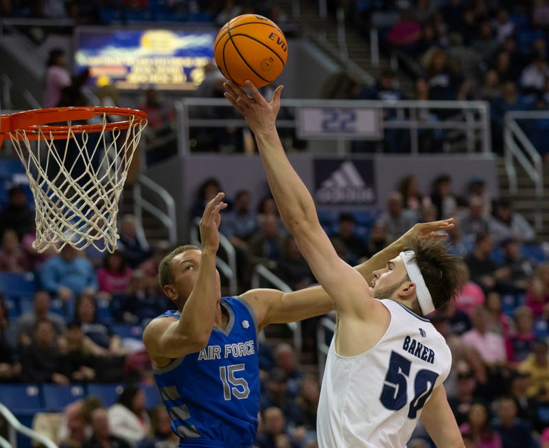 Nevada center Will Baker (50) shoots over Air Force forward Corbin Green (15) during the second half at Lawlor Events Center in Reno on Friday, Feb. 3,
