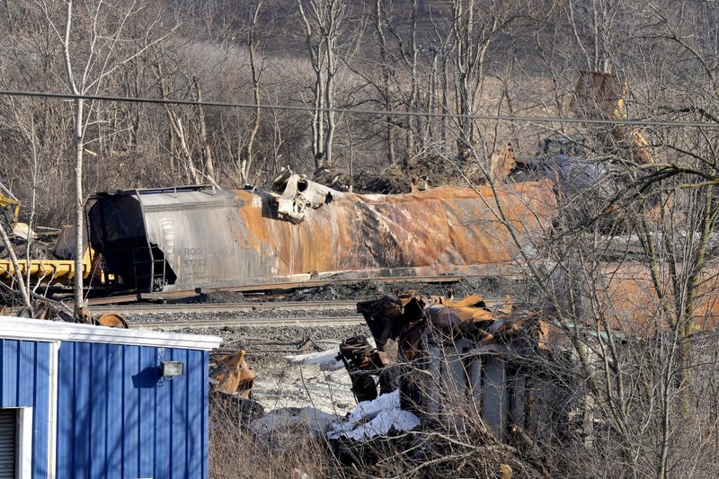 Derailed train cars along East Taggart Street in East Palestine, Ohio as crews continue cleanup Tuesday, February 14, 2023.