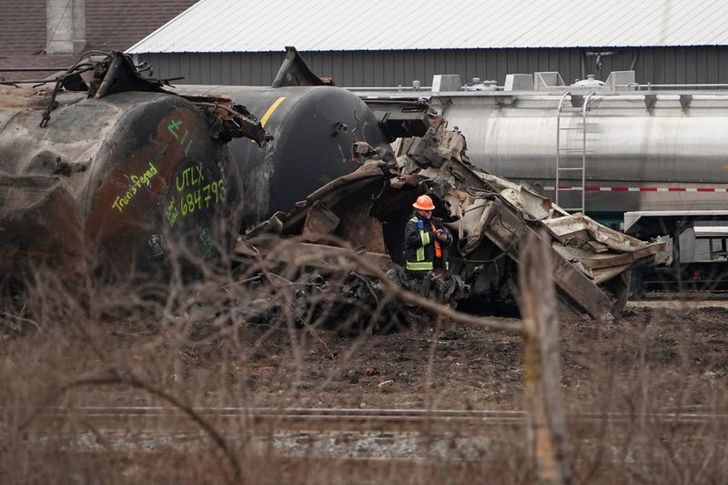 Feb 20, 2023; East Palestine, Ohio, USA; Workers clean up the wreckage of the Norfolk Southern train derailment in East Palestine.