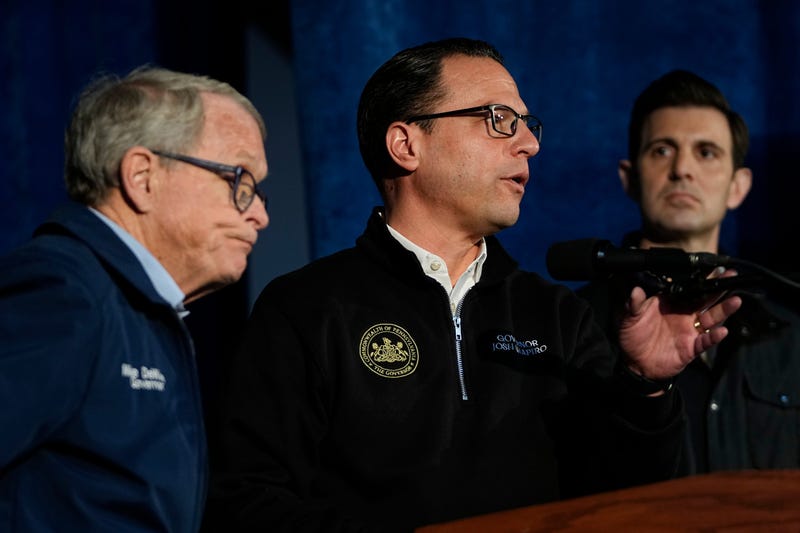 Ohio Gov. Mike DeWine and Pennsylvania Gov. Josh Shapiro speak during a news conference at the East Palestine community center.