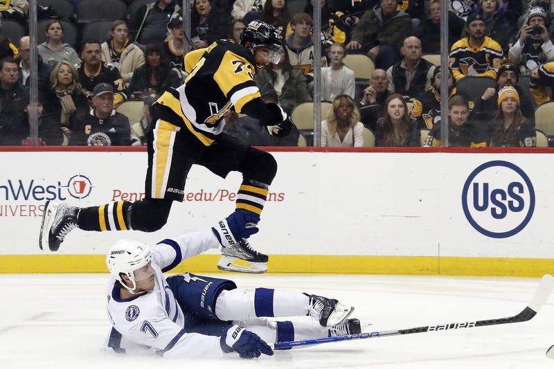 PO Joseph jumping over a Tampa Bay player
