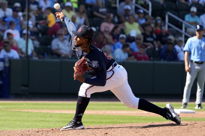 Pitcher Roddery Munoz (69) throws a pitch in the seventh inning