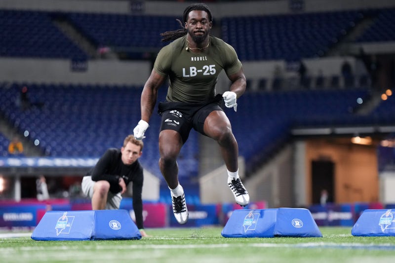 Kansas linebacker Lonnie Phelps (LB25) participates in drills during the NFL Combine at Lucas Oil Stadium. Mandatory