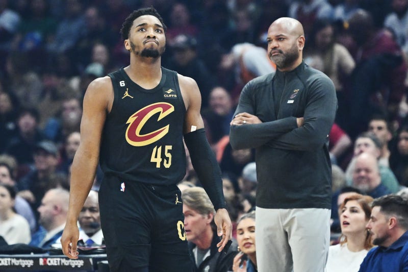 Cleveland Cavaliers guard Donovan Mitchell (45) and head coach J.B. Bickerstaff react after a foul during the first quarter against the Boston Celtics at Rocket Mortgage FieldHouse.