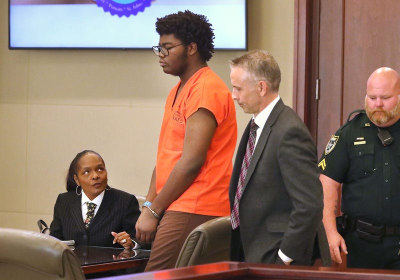 Brendan Depa with his attorneys, Thursday March 9, 2023 during a hearing.