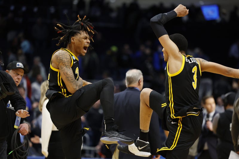 Greg Elliott and Nike Sibande dancing