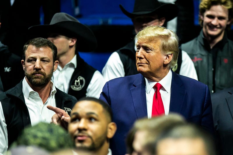 Former President Donald Trump gets off his plane after landing at the Waco Regional Airport for his Make America Great Again Rally in Waco, Texas, March 25, 2023. 
