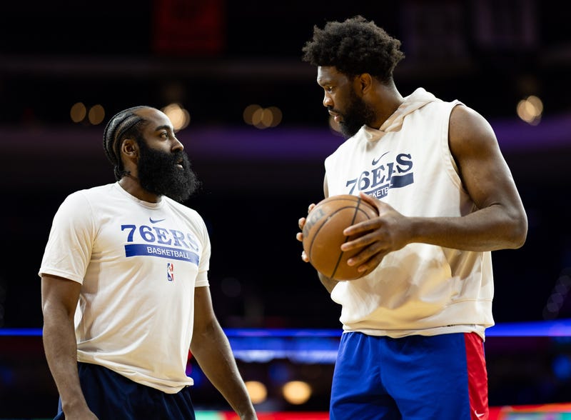 Philadelphia 76ers guard James Harden (left) and center Joel Embiid (right) before action against the Chicago Bulls at Wells Fargo Center on March 20, 2023, Philadelphia, Pennsylvania.