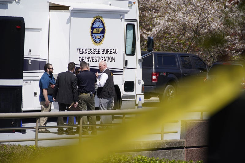 Metro Nashville Police officers gather near Covenant School where three children and three adults were killed by a female shooter Monday, March 27, 2023 in Nashville, Tenn. The perpetrator was killed by police at the scene.