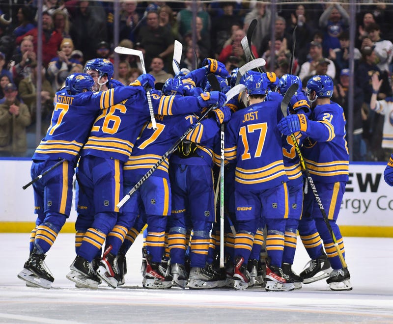 Sabres celebrate an overtime win