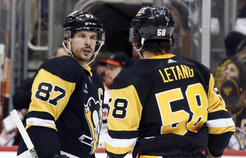 Kris Letang and Sidney Crosby