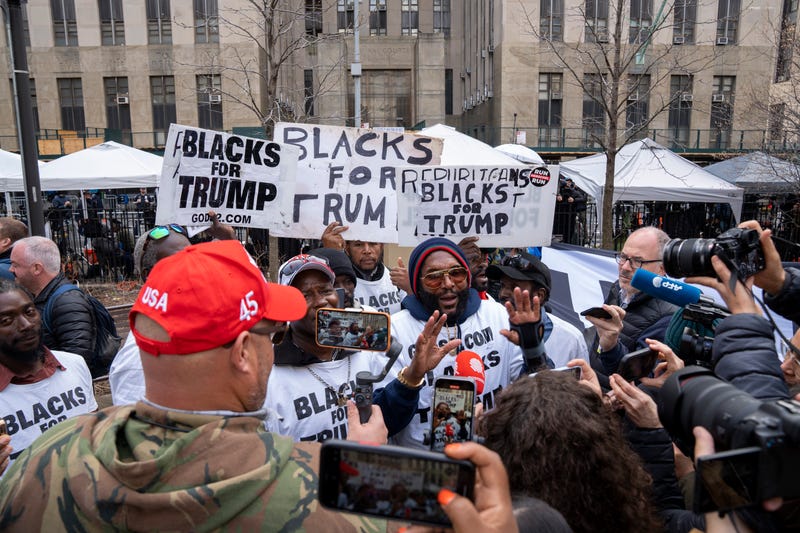 Protesters and media gather outside the Manhattan Criminal Courthouse in New York City. Former President Donald Trump is expected to be arraigned on Tuesday, April 4, 2023 at the Manhattan Criminal Courthouse in New York City after a grand jury voted to indict him .