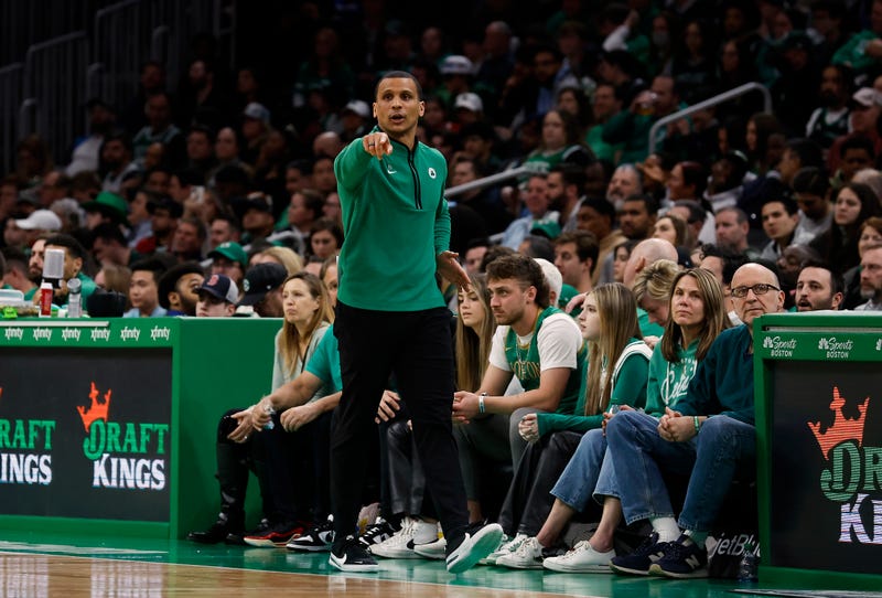 Joe Mazzulla directs the Celtics from the sideline.