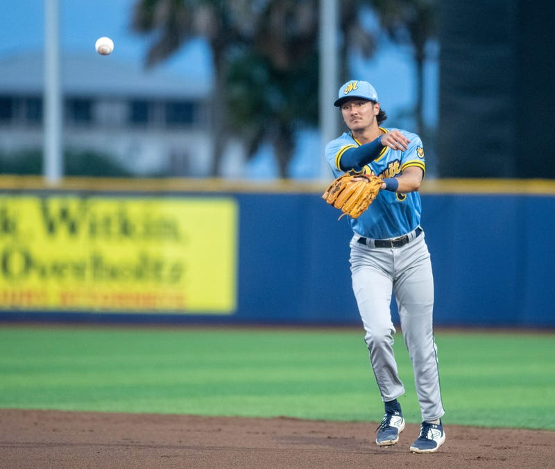 Second baseman Alika Williams (7) throws to first for an out during the Montgomery Biscuits vs Pensacola Blue Wahoos baseball game