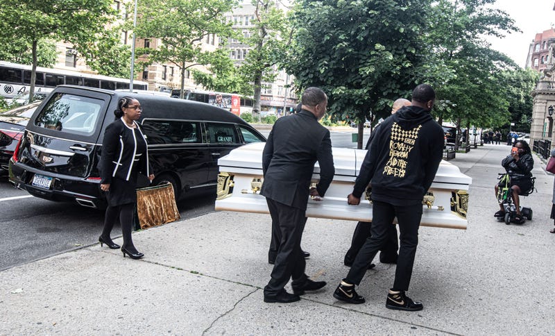 The casket of Jordan Neely is carried into Mount Neboh Baptist Church in Harlem on May 19, 2023