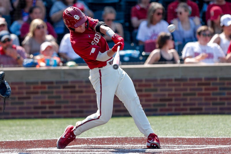 Easton Carmichael hitting at Oklahoma