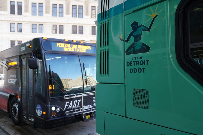 A City of Detroit DDOT bus featuring the Spirit of Detroit