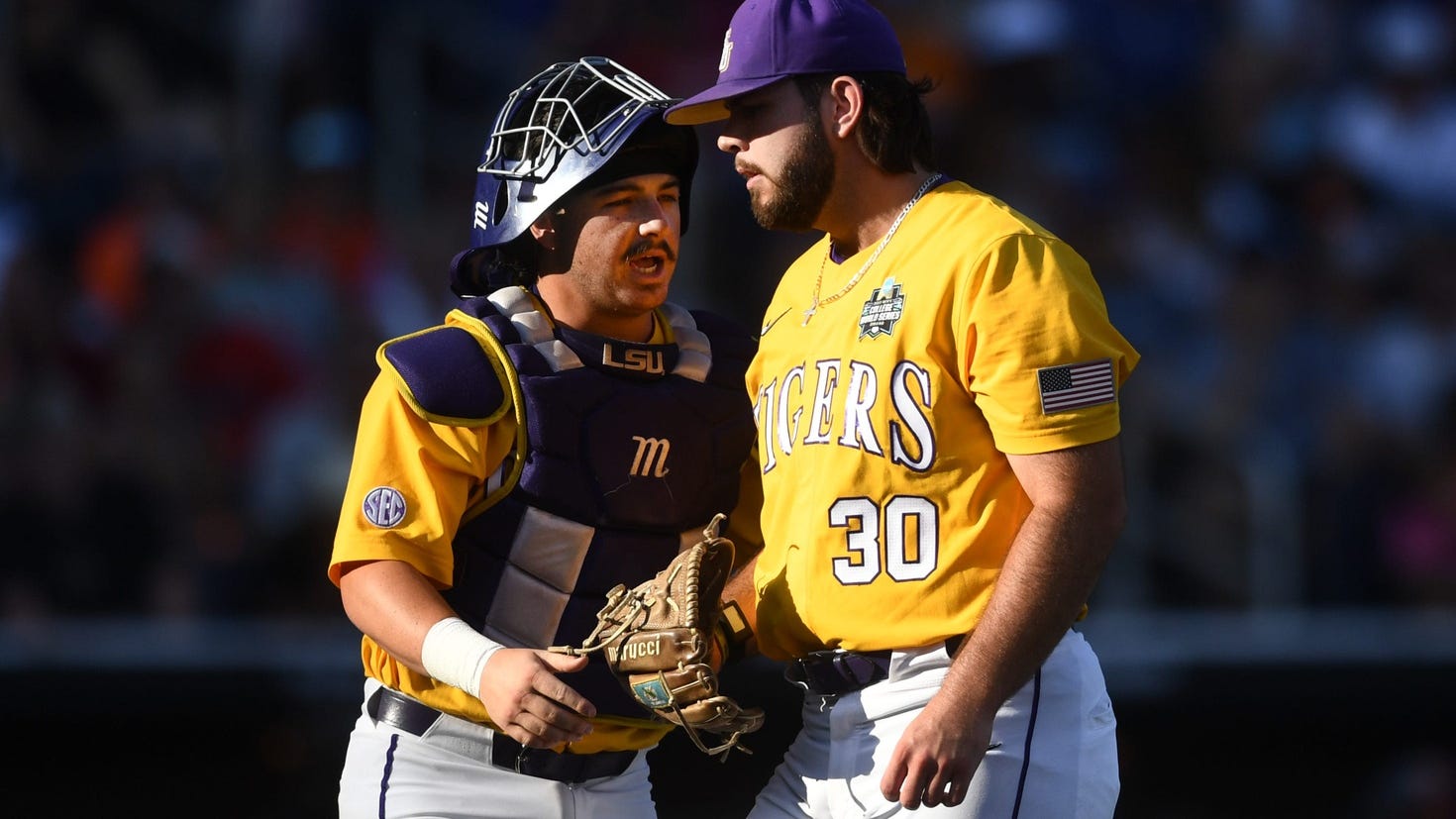 LSU catcher Alex Milazzo hurt while scoring run, gets standing ovation as he's helped off