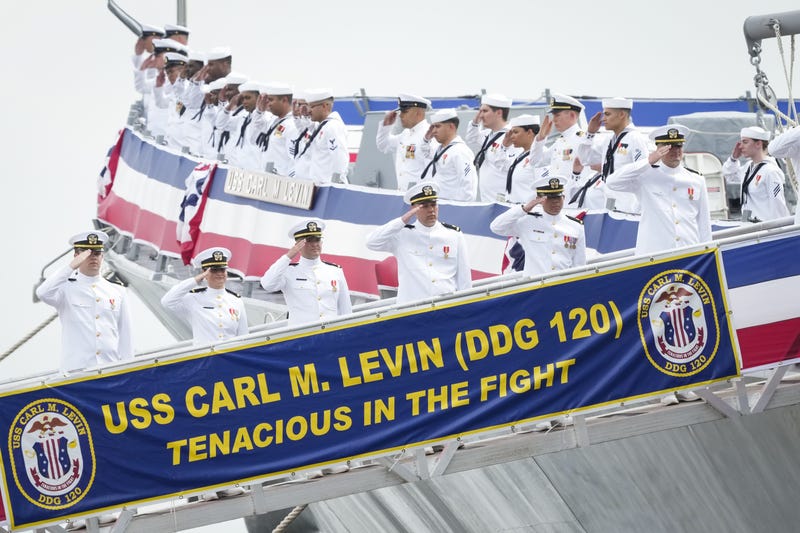 Jun 24, 2023; Baltimore, MD, USA; The crew of the USS Carl M. Levin (DDG 120) man the ship at the conclusion of the Commissioning ceremony for the USS Carl M. Levin (DDG 120) in Baltimore, MD on Saturday, June 24, 2023. The USS Carl M. Levin is a United States Navy Arleigh Burke-class Flight IIA guided missile destroyer, the 70th overall for the class. The ship s namesake served in the U.S. Senate for 36 years from 1979-2015. As the longest serving senator in Michigan state history, Levin became a staunch supporter of the armed services through his work and leadership as Chairman and Ranking Member of the Senate Committee on Armed Services. Levin passed away on July 29, 2021