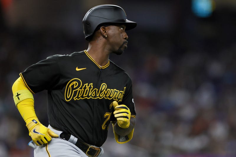 Pittsburgh Pirates designated hitter Andrew McCutchen (22) runs toward first base after hitting a single against the Miami Marlins
