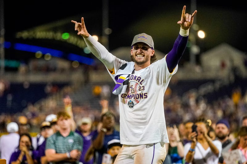 LSU Tigers center fielder Dylan Crews (3) celebrates after winning the College World Series over the Florida Gators