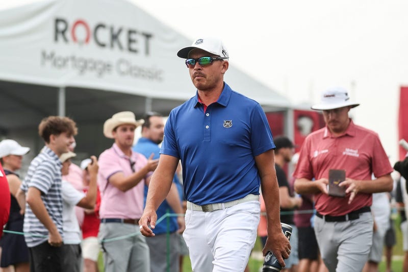 Jun 29, 2023; Detroit, Michigan, USA; Rickie Fowler walks towards the 16th tee box during the first round of the Rocket Mortgage Classic golf tournament at Detroit Golf Club.
