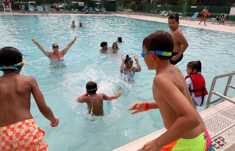 People cool off at the Playland pool in Rye this summer