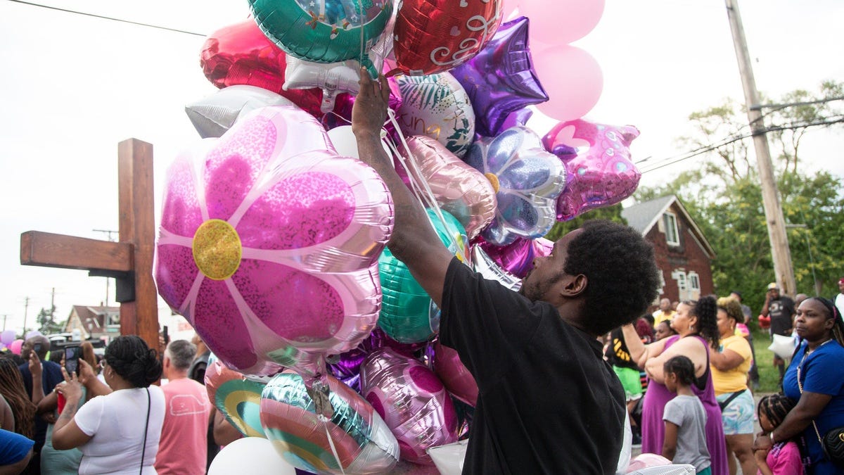 'An innocent life taken away too soon': Detroit gathers for first of two vigils to mourn death of 2-year-old Wynter