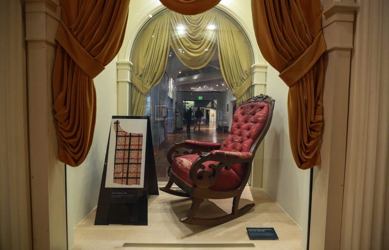 The upholstered seat rocking chair in which President Abraham Lincoln was assassinated on April 14, 1865, that was originally located in the president's special box in Ford's Theatre, Washington, D.C. now sits on display at the Henry Ford Museum in Dearborn.