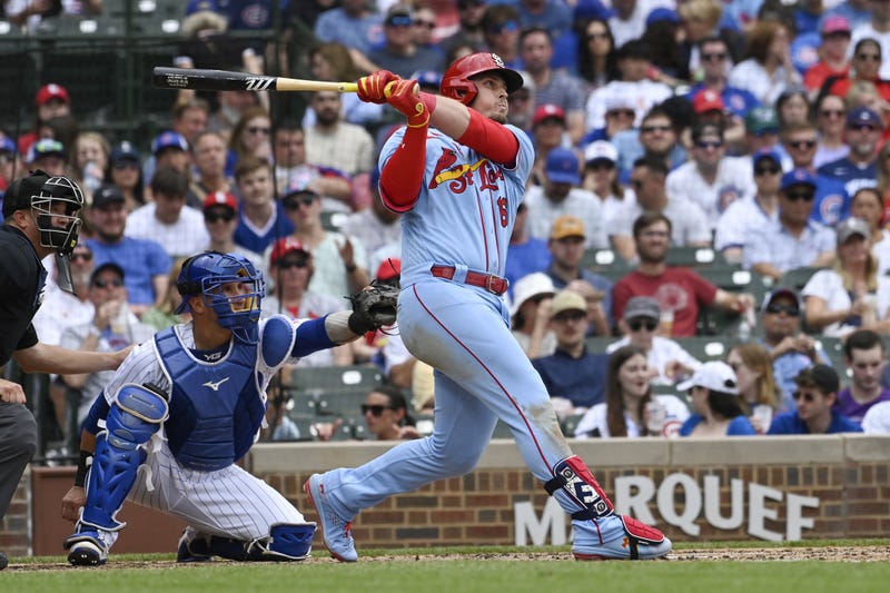 St. Louis Cardinals second baseman Nolan Gorman (16) hits a solo home run against the Chicago Cubs during the fifth inning at Wrigley Field. Mandatory Credit: Matt Marton-USA TODAY Sports