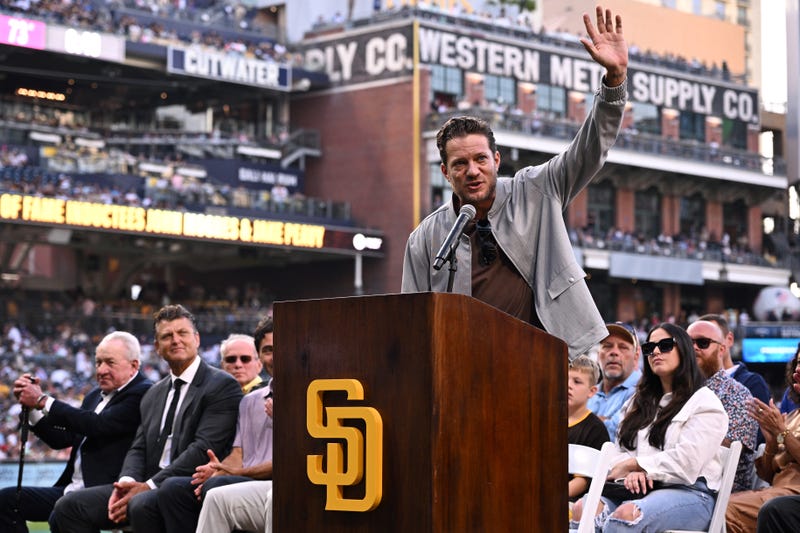San Diego Padres former pitcher Jake Peavy waves to the crowd after being inducted into the Padres Hall of Fame before the game against the Texas Rangers at Petco Par
