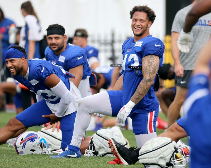 Matt Milano, Micah Hyde and Terrel Bernard