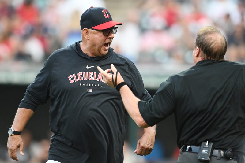 Cleveland Guardians manager Terry Francona, left, argues with umpire Bruce Dreckman after shortstop Brayan Rocchio (not pictured) was ruled out at second base after a replay review during the fourth inning against the Chicago White Sox Progressive Field. Francona was ejected.