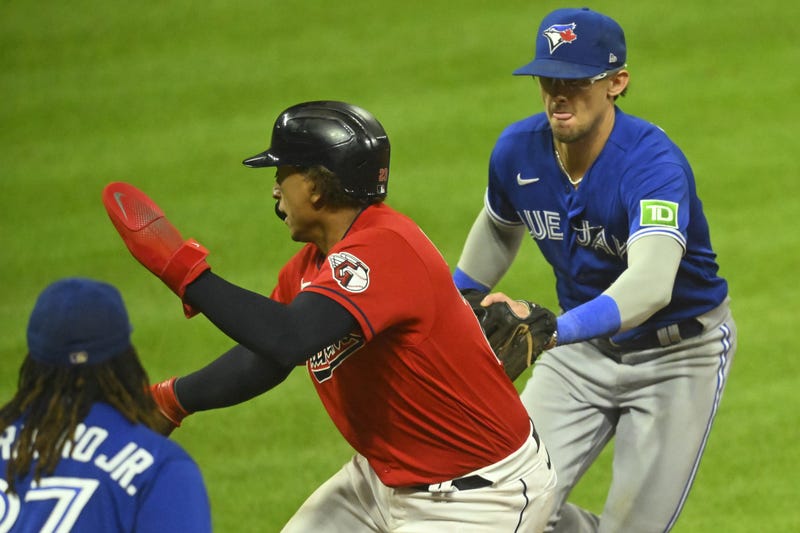 Aug 7, 2023; Cleveland, Ohio, USA; Toronto Blue Jays second baseman Cavan Biggio (8) tags Cleveland Guardians catcher Bo Naylor (23) to start an unassisted double play in the eighth inning at Progressive Field. 